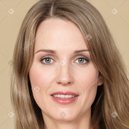 Joyful white young-adult female with long  brown hair and green eyes