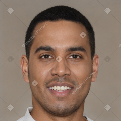 Joyful black young-adult male with short  black hair and brown eyes