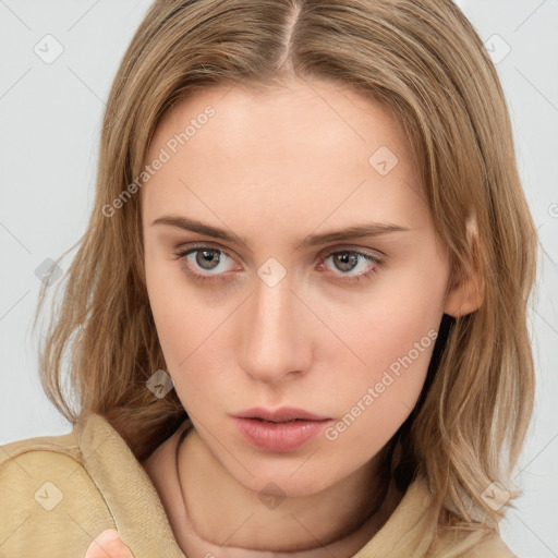 Neutral white young-adult female with long  brown hair and brown eyes