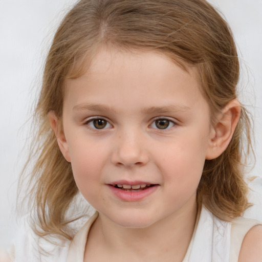 Joyful white child female with medium  brown hair and grey eyes