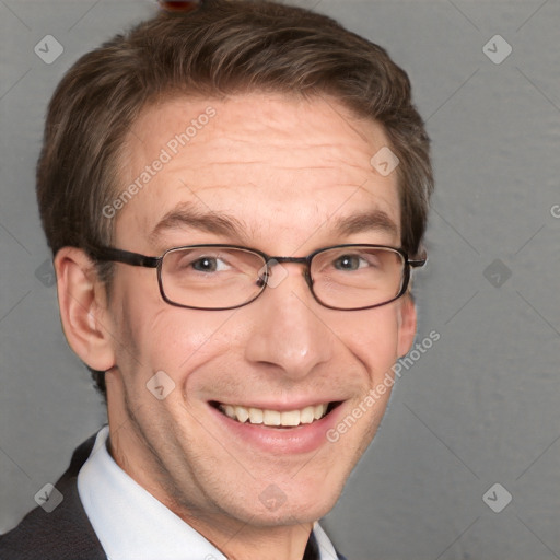 Joyful white middle-aged male with short  brown hair and grey eyes