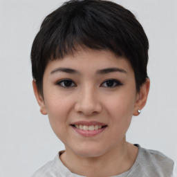 Joyful white child female with short  brown hair and brown eyes