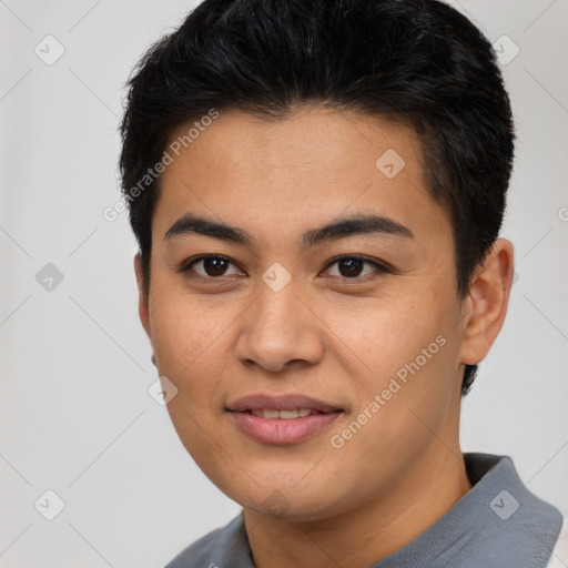 Joyful asian young-adult male with short  brown hair and brown eyes