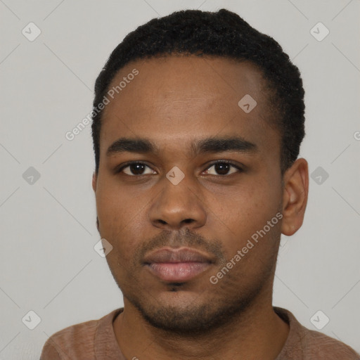 Neutral latino young-adult male with short  black hair and brown eyes