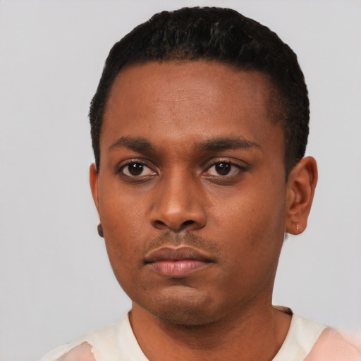 Neutral black young-adult male with short  black hair and brown eyes