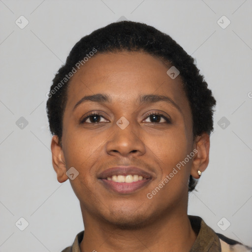 Joyful black young-adult female with short  black hair and brown eyes