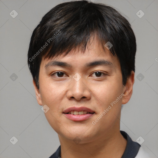 Joyful asian young-adult male with short  black hair and brown eyes