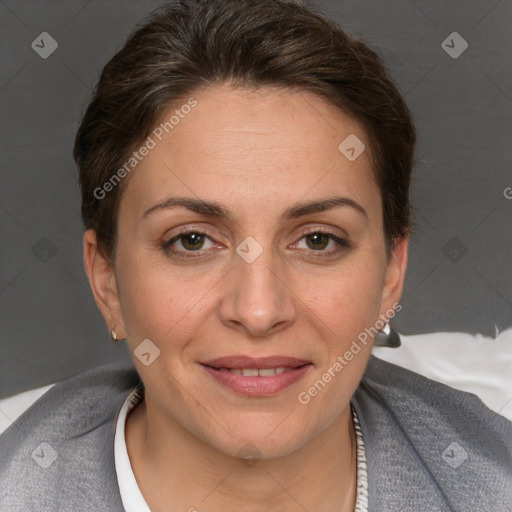 Joyful white adult female with short  brown hair and brown eyes