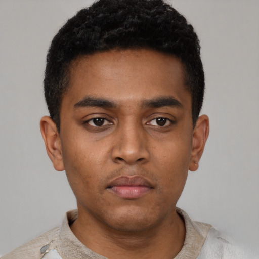 Neutral black young-adult male with short  black hair and brown eyes