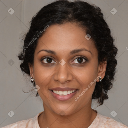 Joyful black young-adult female with medium  brown hair and brown eyes