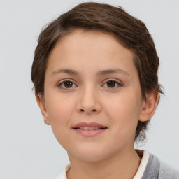 Joyful white child female with short  brown hair and brown eyes