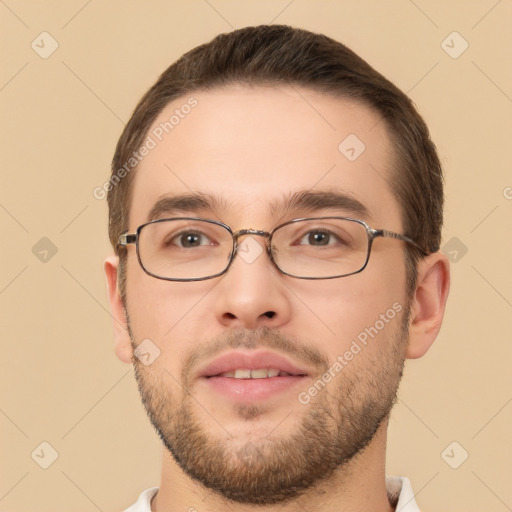 Joyful white young-adult male with short  brown hair and brown eyes