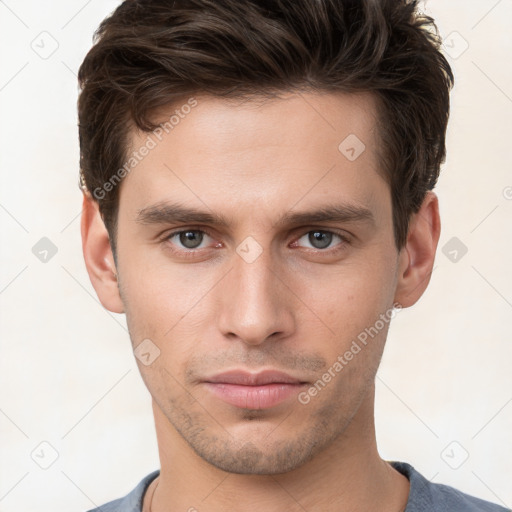 Neutral white young-adult male with short  brown hair and brown eyes