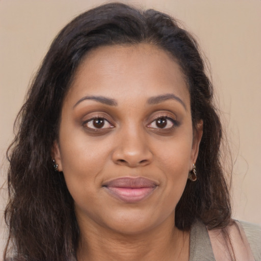 Joyful asian young-adult female with long  brown hair and brown eyes