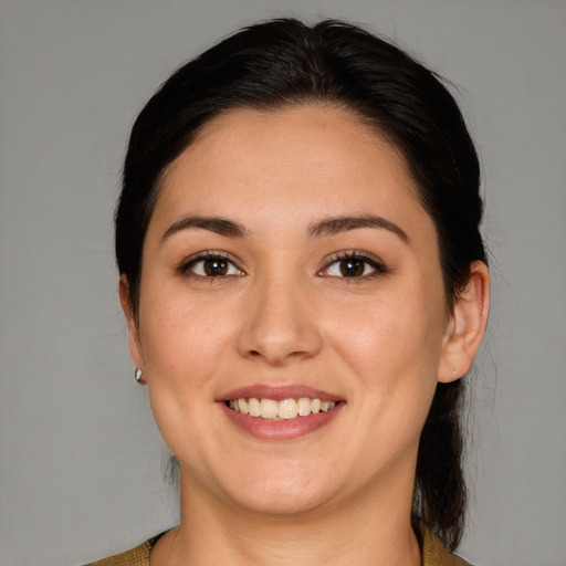 Joyful white young-adult female with medium  brown hair and brown eyes