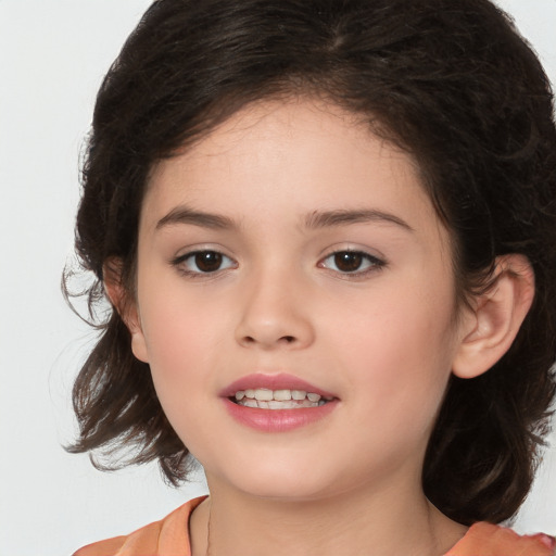 Joyful white child female with medium  brown hair and brown eyes