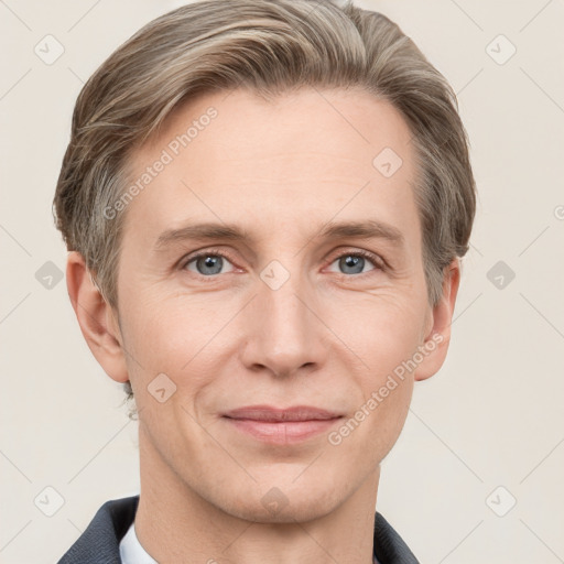 Joyful white adult male with short  brown hair and grey eyes