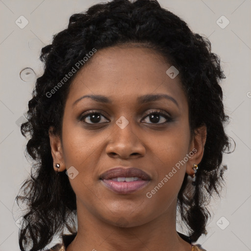 Joyful black young-adult female with medium  black hair and brown eyes