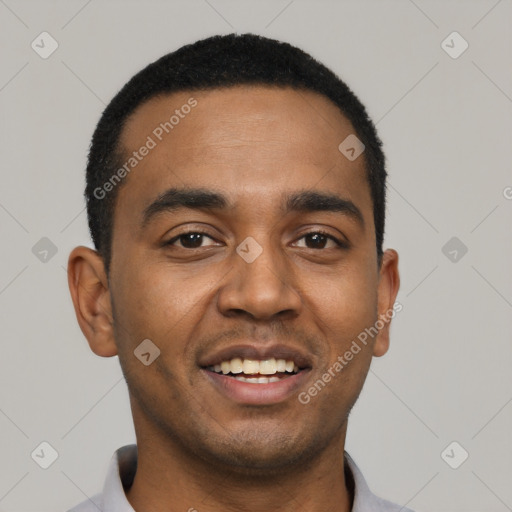 Joyful black young-adult male with short  black hair and brown eyes