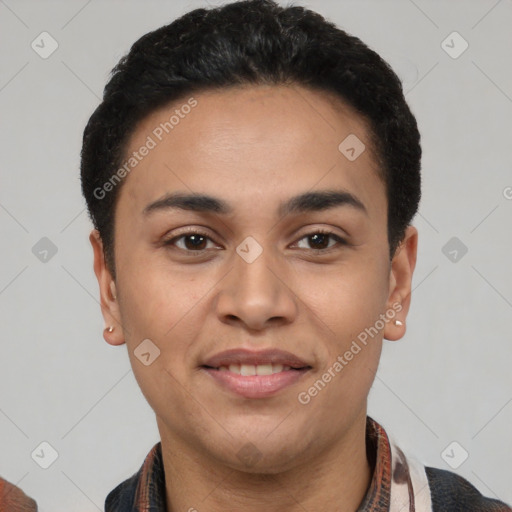 Joyful latino young-adult male with short  black hair and brown eyes