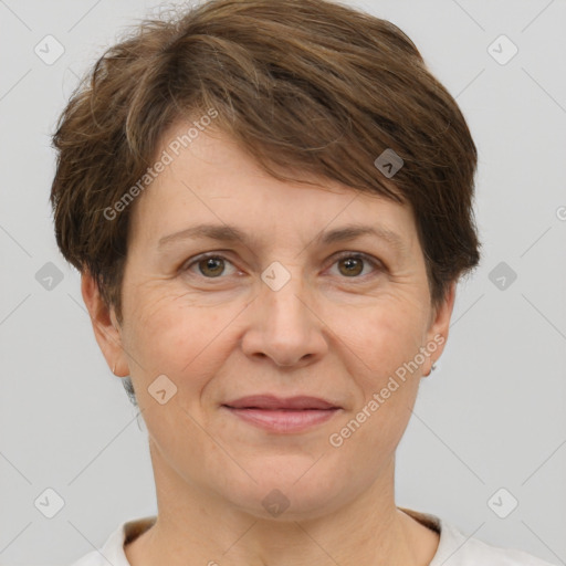 Joyful white adult female with short  brown hair and brown eyes