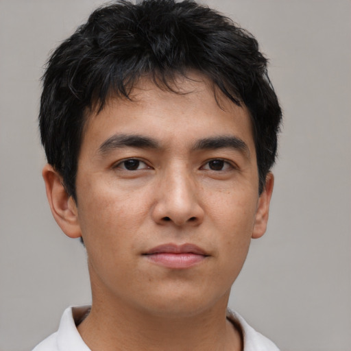 Neutral asian young-adult male with short  brown hair and brown eyes