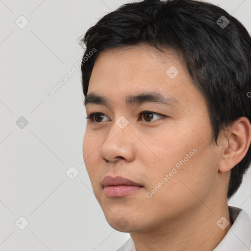 Neutral asian young-adult male with short  black hair and brown eyes