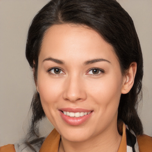 Joyful white young-adult female with medium  brown hair and brown eyes