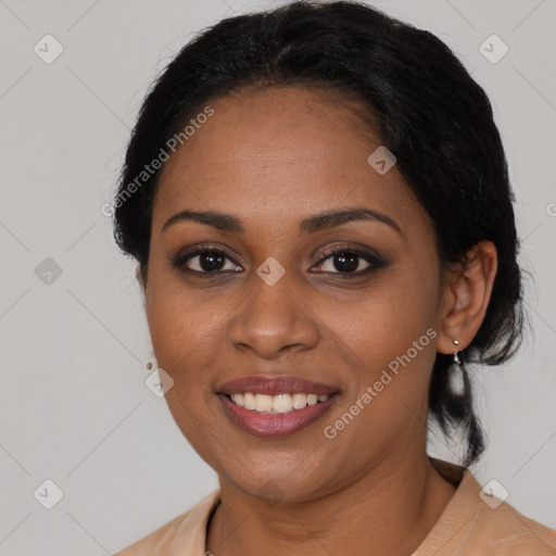 Joyful black young-adult female with medium  brown hair and brown eyes