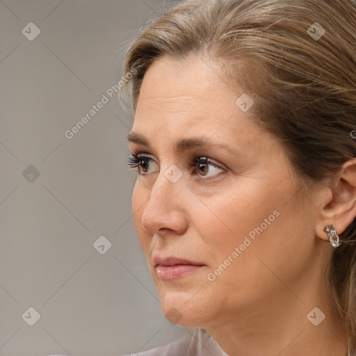 Neutral white adult female with medium  brown hair and brown eyes