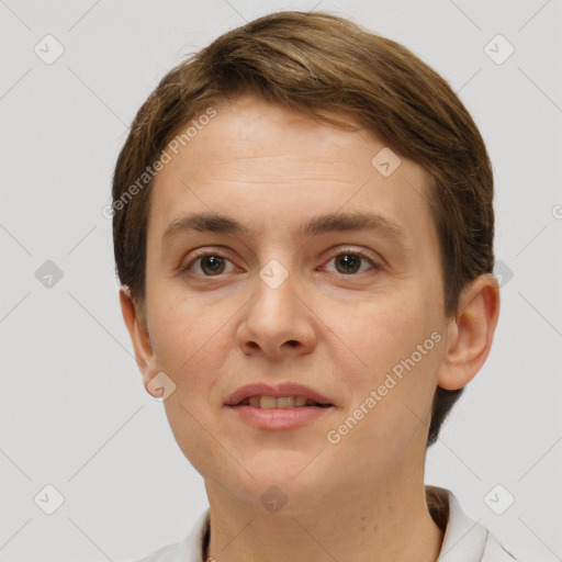 Joyful white young-adult female with short  brown hair and brown eyes