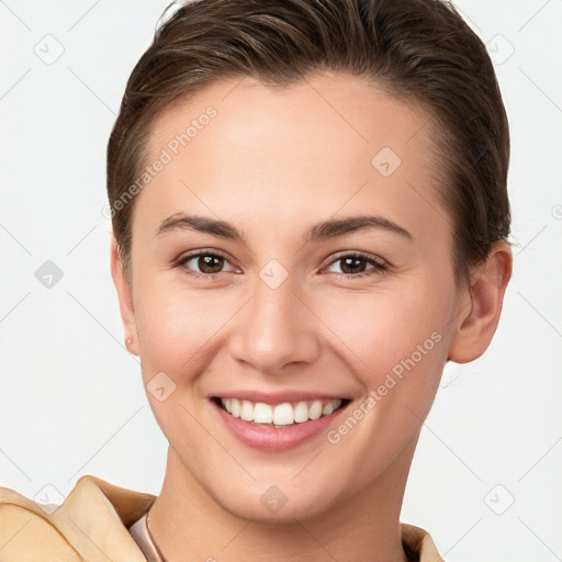 Joyful white young-adult female with short  brown hair and brown eyes