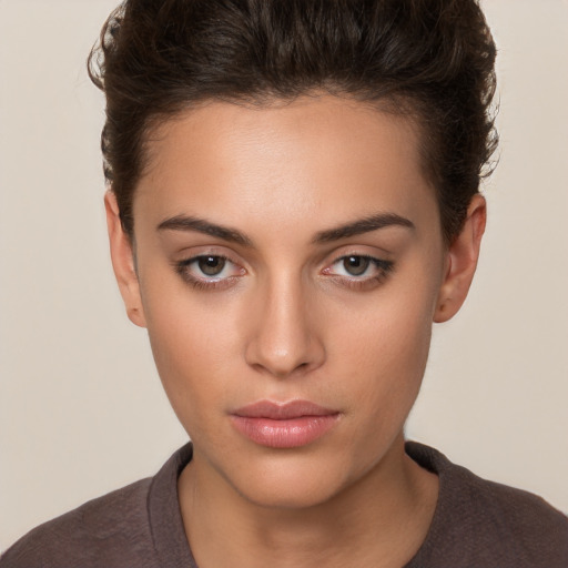 Neutral white young-adult female with short  brown hair and brown eyes