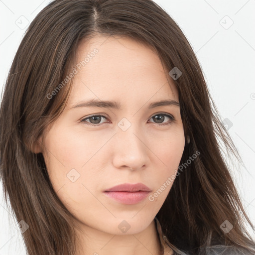 Neutral white young-adult female with long  brown hair and brown eyes