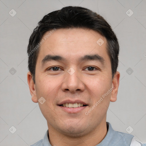 Joyful white young-adult male with short  black hair and brown eyes