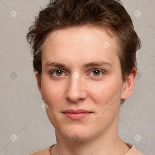 Joyful white young-adult female with short  brown hair and grey eyes