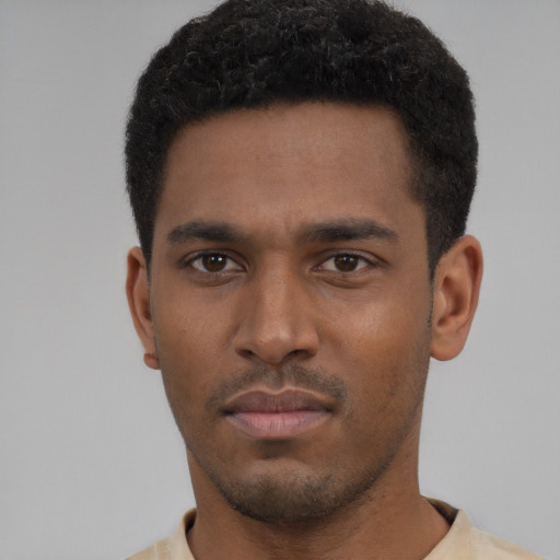 Neutral latino young-adult male with short  black hair and brown eyes