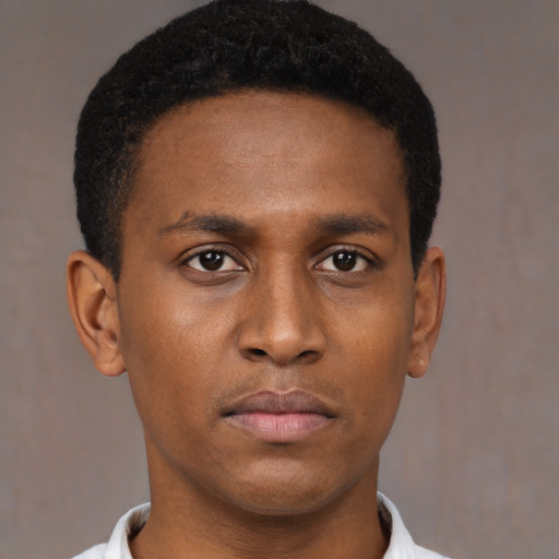 Neutral black young-adult male with short  brown hair and brown eyes