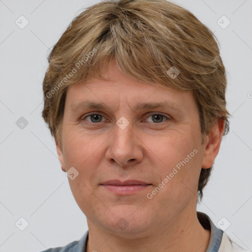 Joyful white adult male with short  brown hair and grey eyes