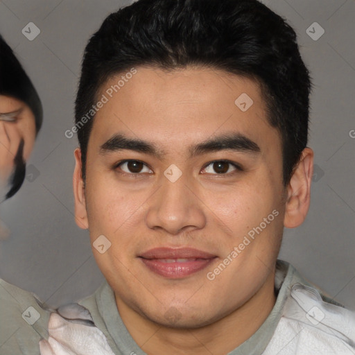 Joyful asian young-adult male with short  brown hair and brown eyes