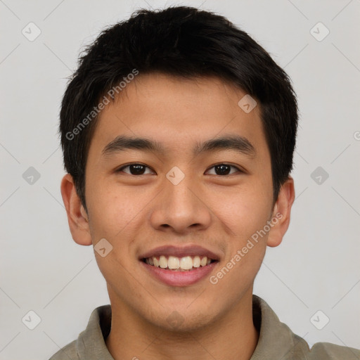 Joyful asian young-adult male with short  brown hair and brown eyes