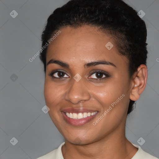 Joyful black young-adult female with short  brown hair and brown eyes