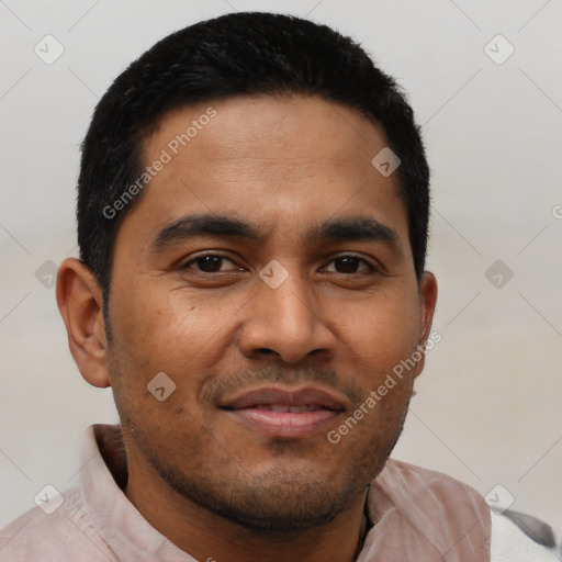 Joyful latino young-adult male with short  black hair and brown eyes