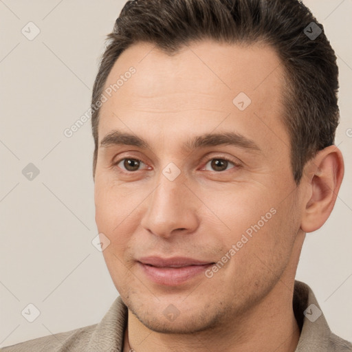 Joyful white young-adult male with short  brown hair and brown eyes