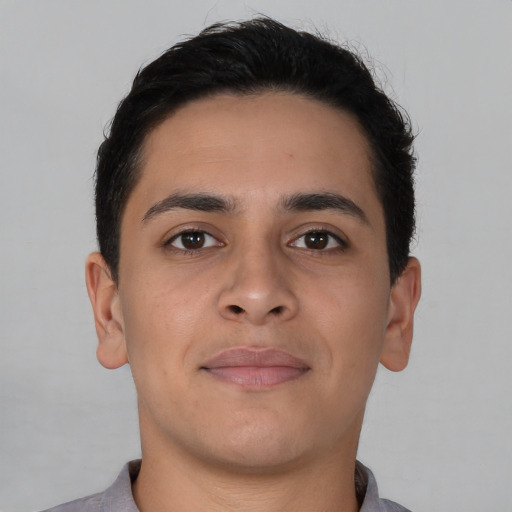 Neutral latino young-adult male with short  brown hair and brown eyes