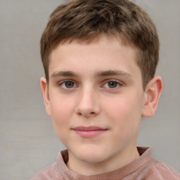 Joyful white child male with short  brown hair and grey eyes