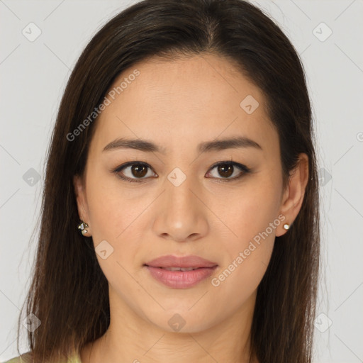 Joyful asian young-adult female with long  brown hair and brown eyes