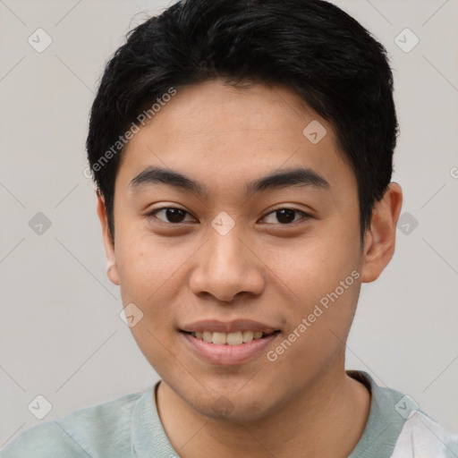 Joyful white young-adult male with short  black hair and brown eyes