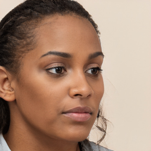 Neutral latino young-adult female with medium  brown hair and brown eyes