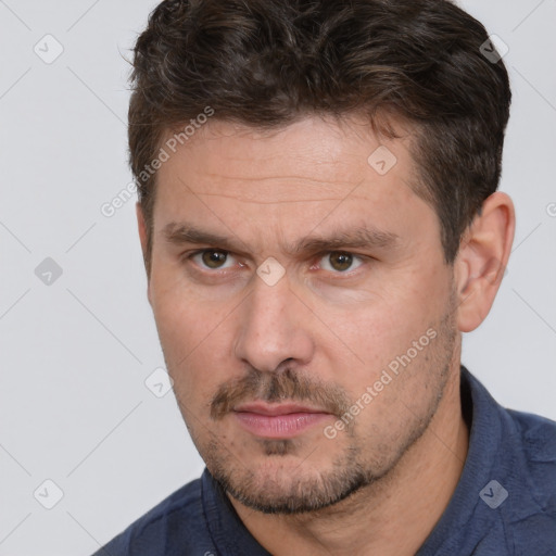 Neutral white adult male with short  brown hair and brown eyes